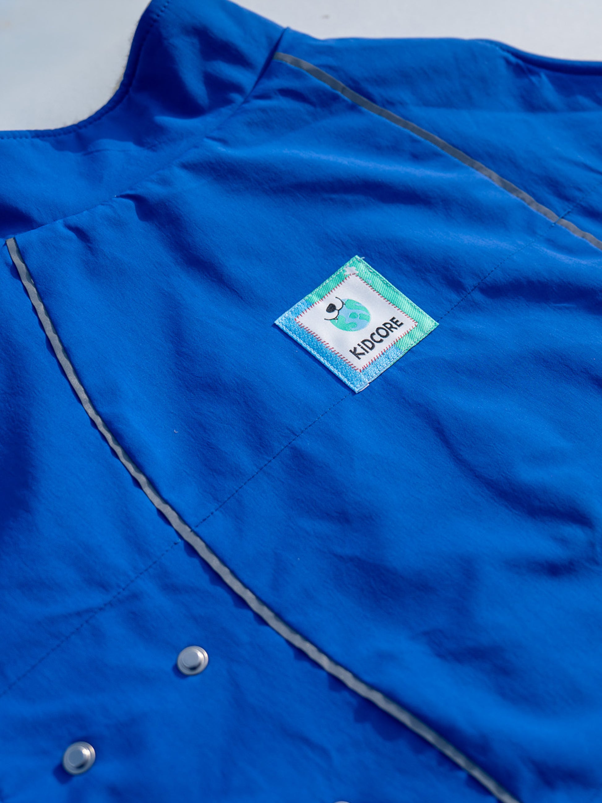 Water-Repellent Fabric and Logo Detail - KIDCORE Blue Dog Vest